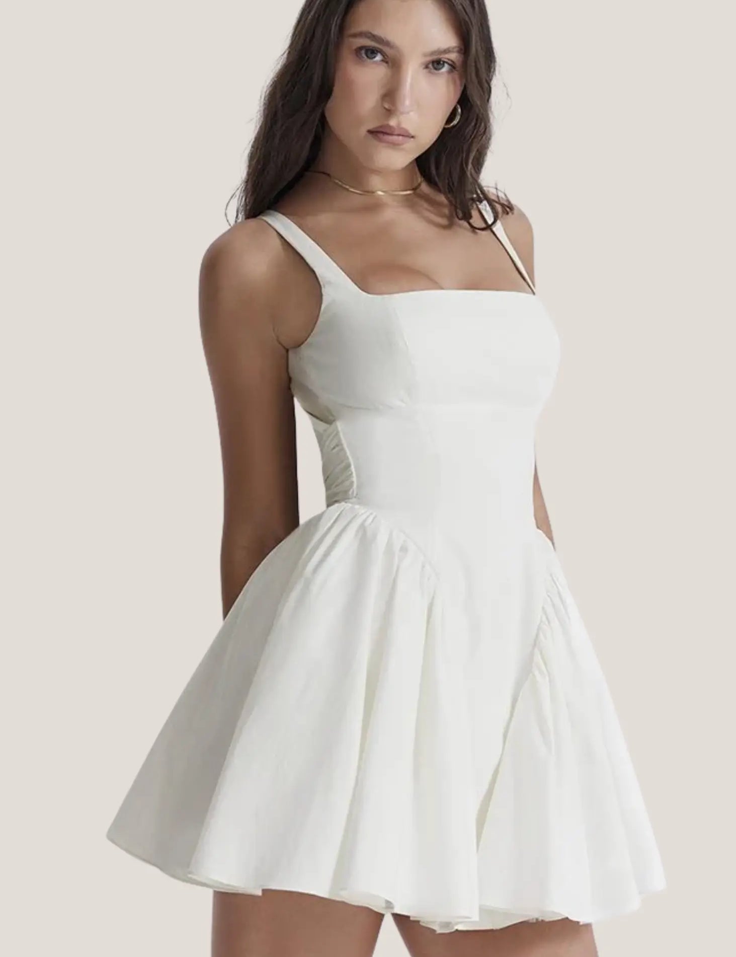 A-deep-V-neckline.-cinched-waist.-and-graceful-long-sleeves-effortless-drama-for-every-event-1.webp