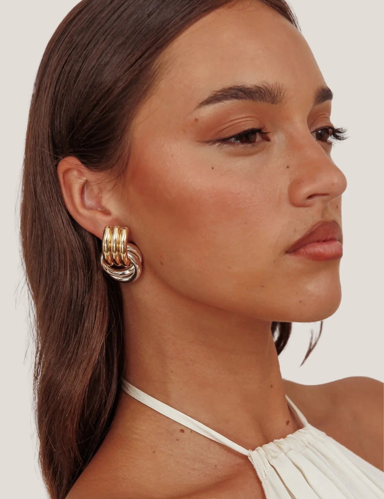Georgina-Two-Tone-Gold-Loop-Earrings-2.webp