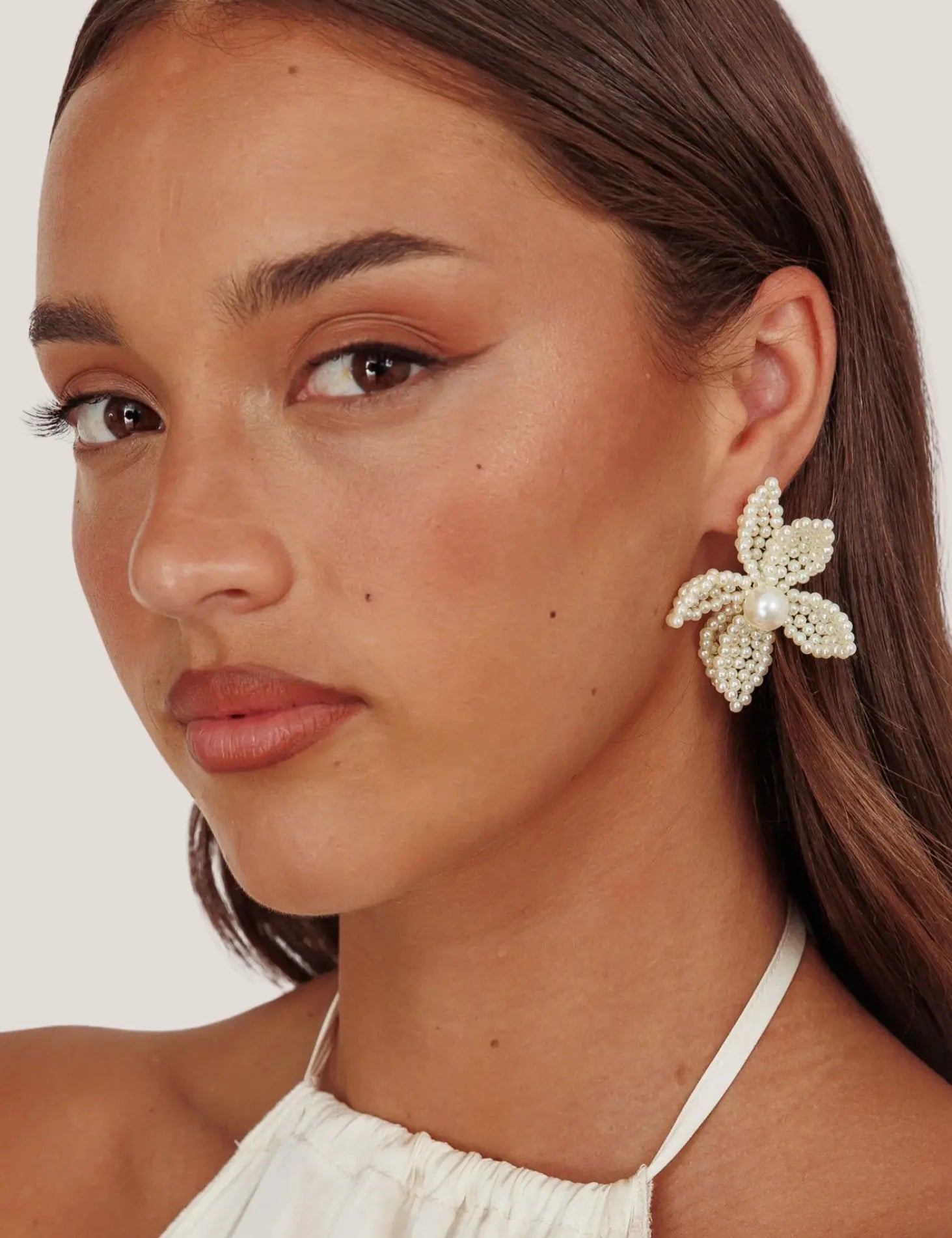 Kaley-Flower-Pearl-Statement-Earrings-1.webp