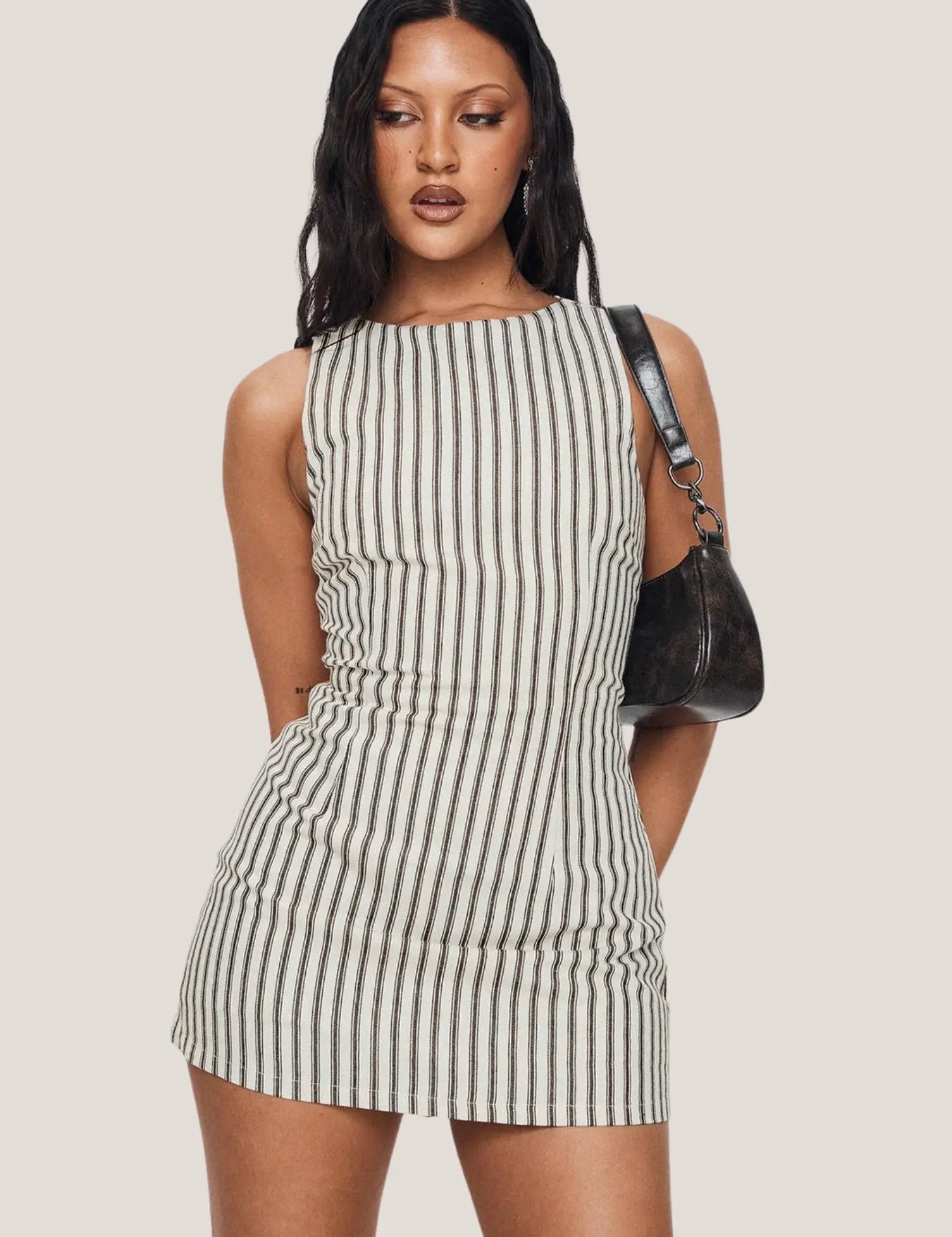 ashley-stripe-summer-romper-black-1_df7b37f9-9275-46a9-98ec-97d075009391.webp