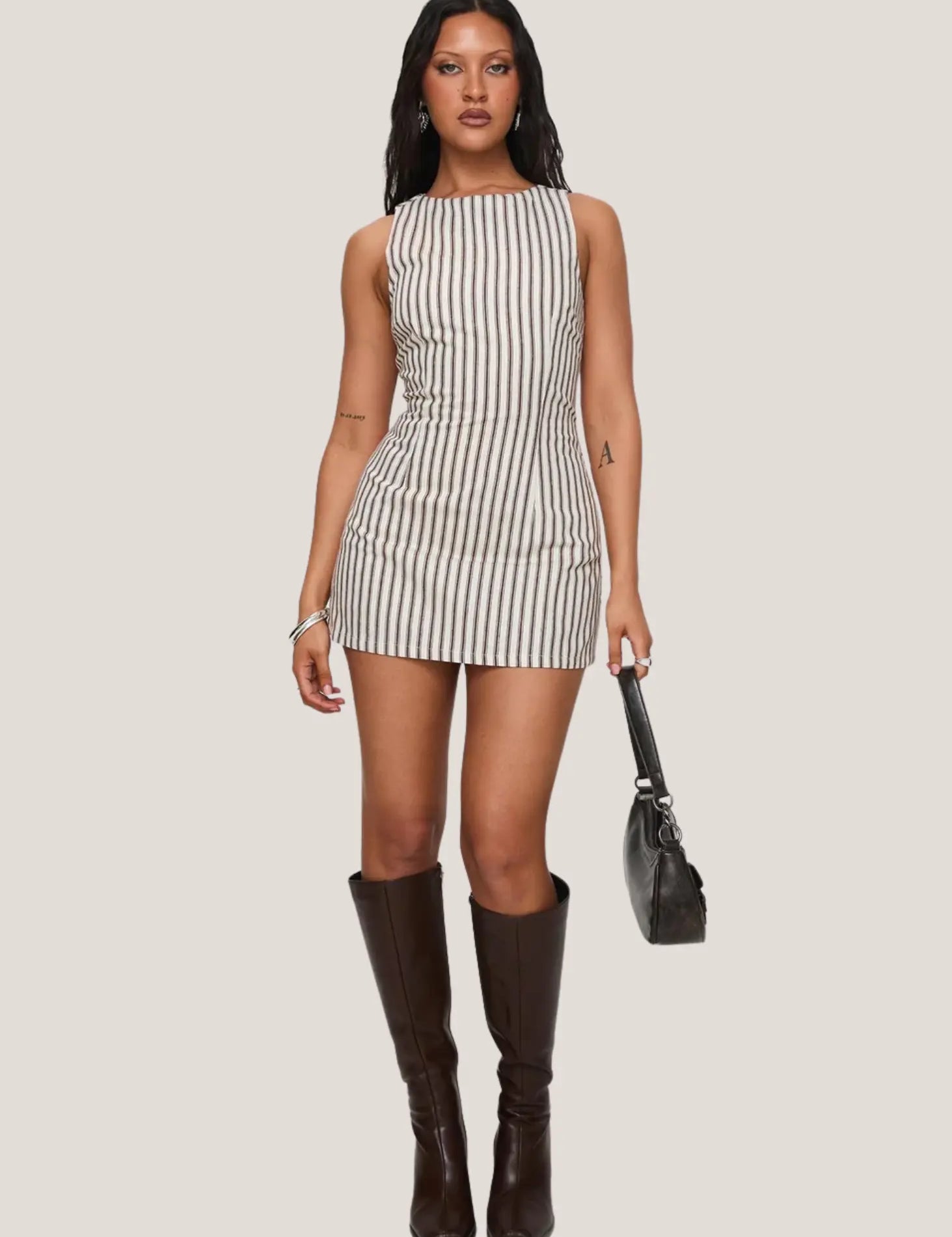 ashley-stripe-summer-romper-black-2_68e47dd3-f858-4233-a8a2-dac84fcdab57.webp